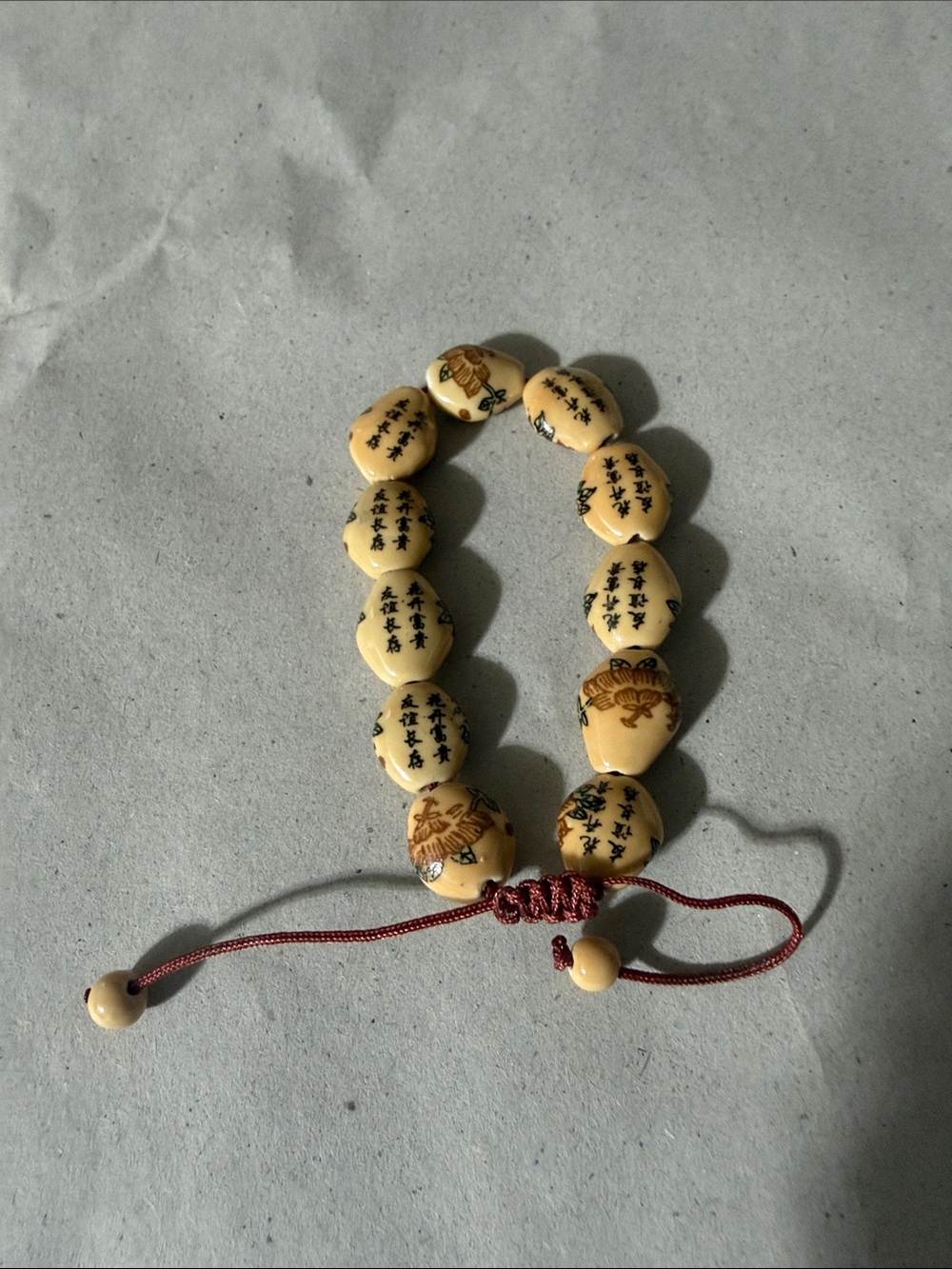 Women’s Beaded Prayer Bracelet in Cream with Red Cord Chinese calligraphy words